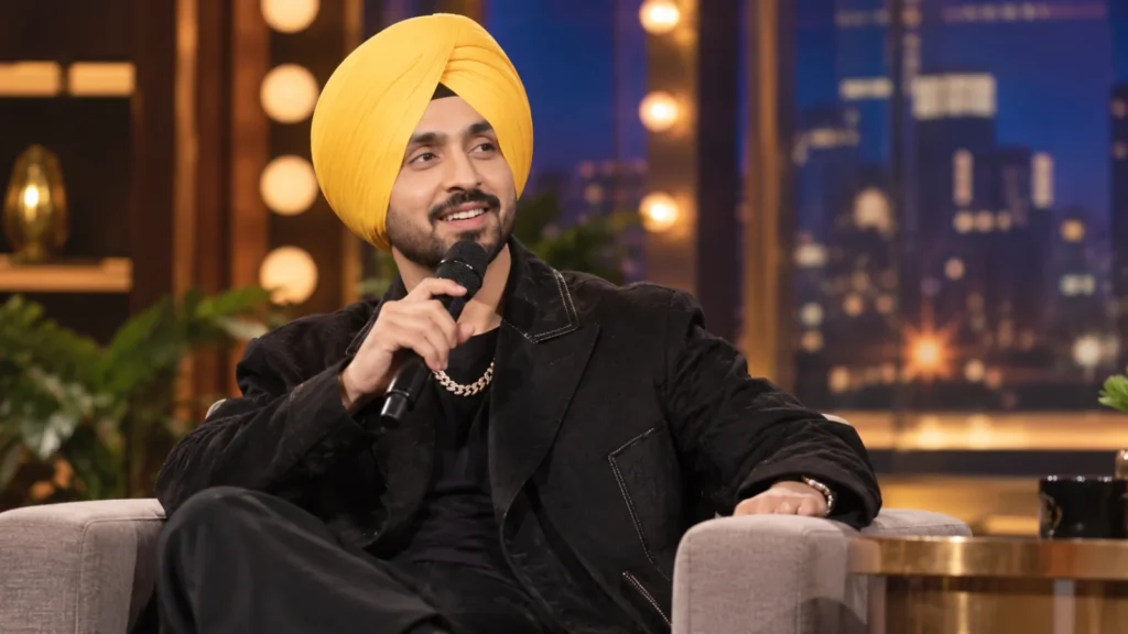 Diljit Dosanjh wearing a turban during an international talk show performance